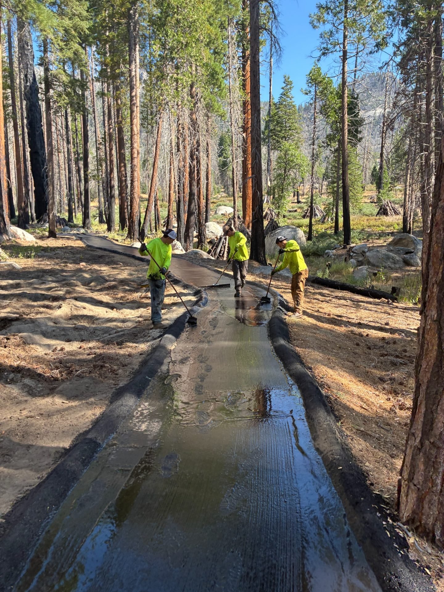 CA Mathes crew applying seal coat to the new Bush Loop accessible trail